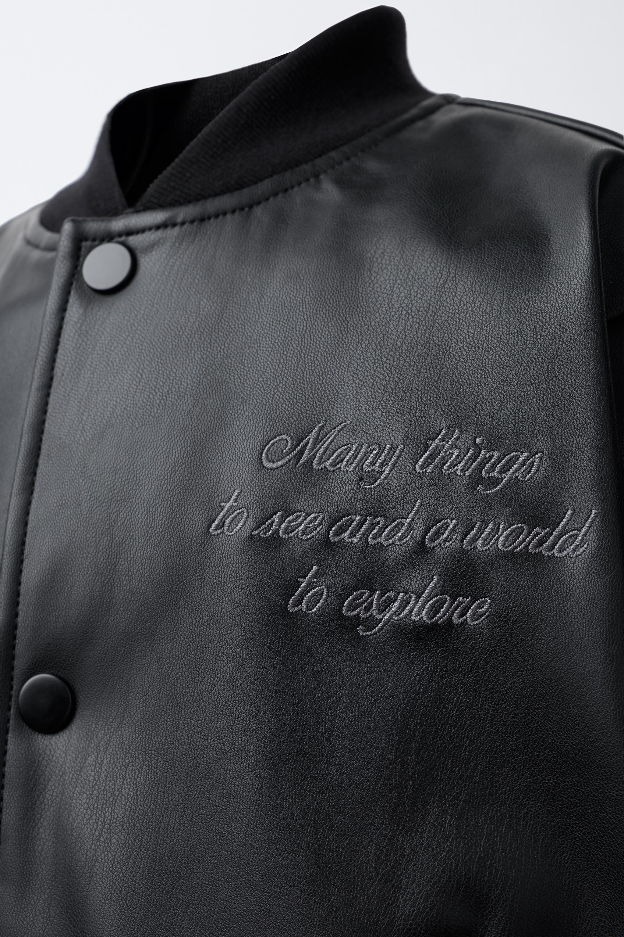 EMBROIDERED TEXT FAUX LEATHER BOMBER JACKET